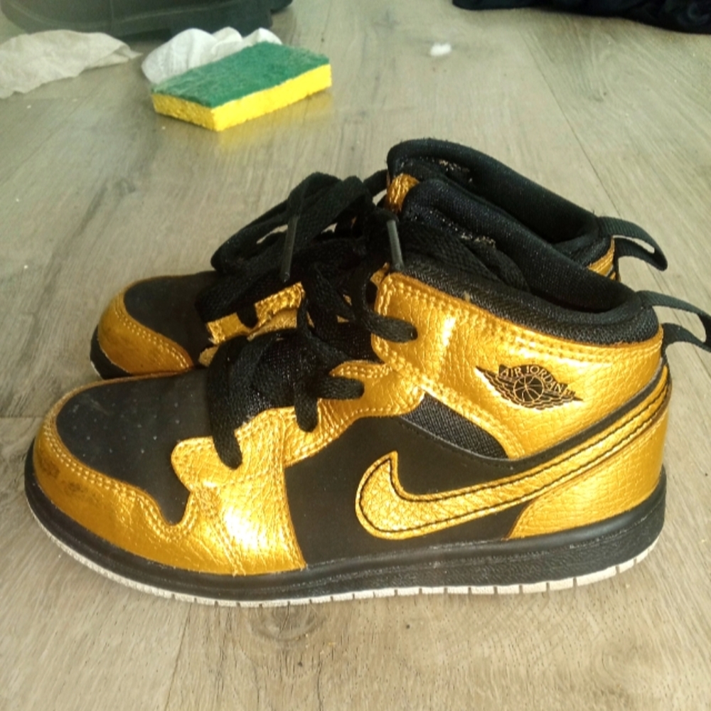 Air Jordan Black and Gold Sneakers